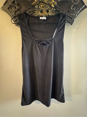 All Tanks 3 for $15!! 🎉 
Black Sleeveless Tank with Front Strap Detail